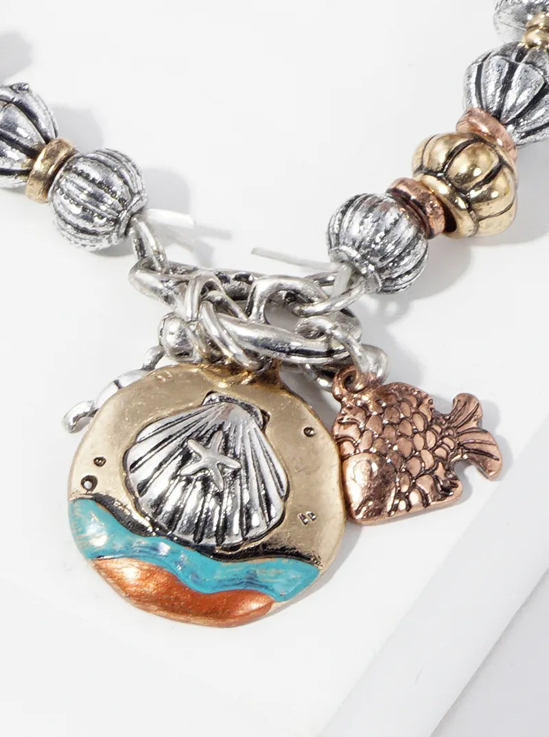 Artisan sea life themed charms metal toggle closure stretch bracelet
