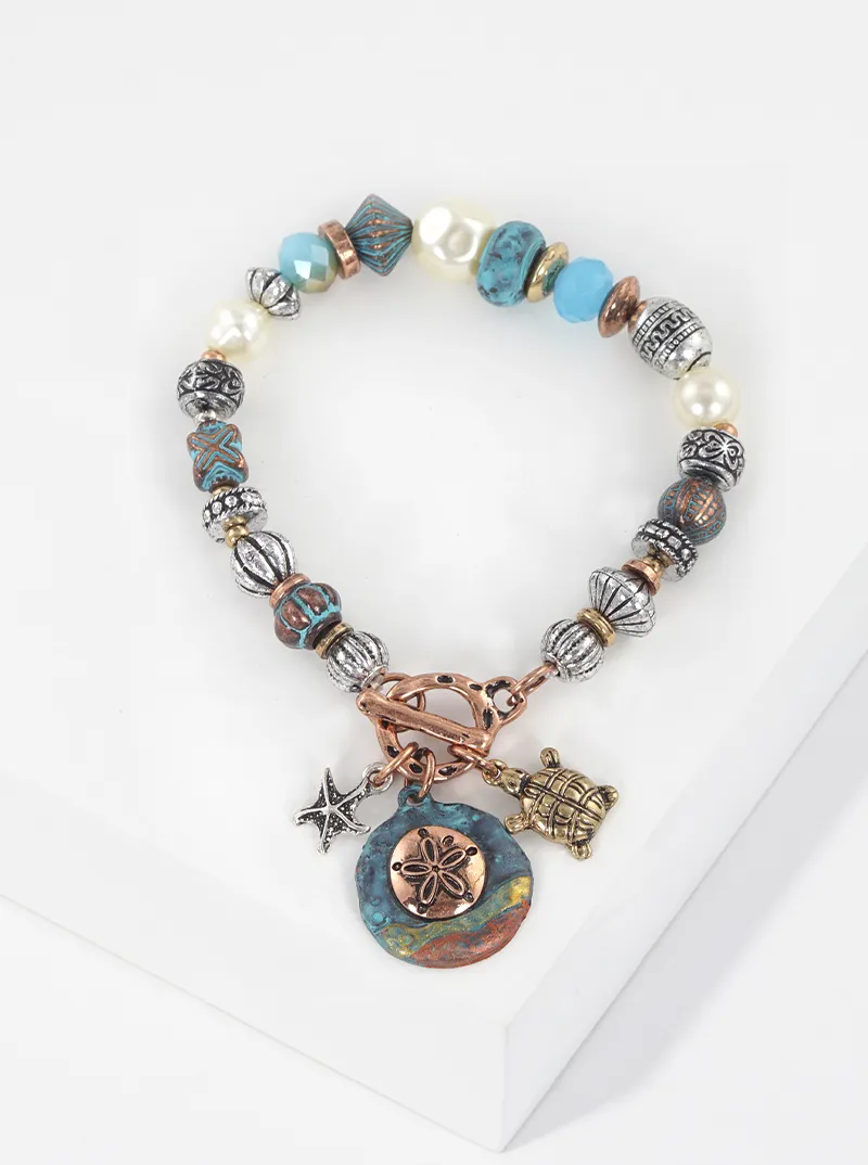 Artisan sea life themed charms metal toggle closure stretch bracelet