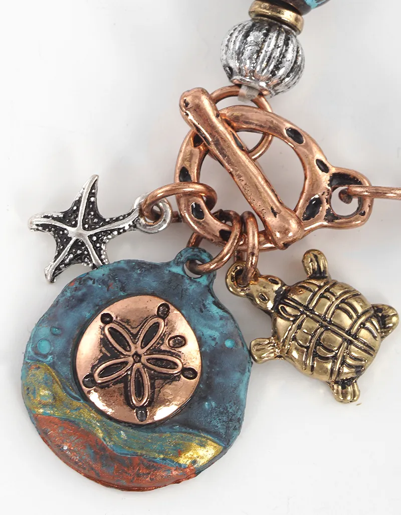 Artisan sea life themed charms metal toggle closure stretch bracelet