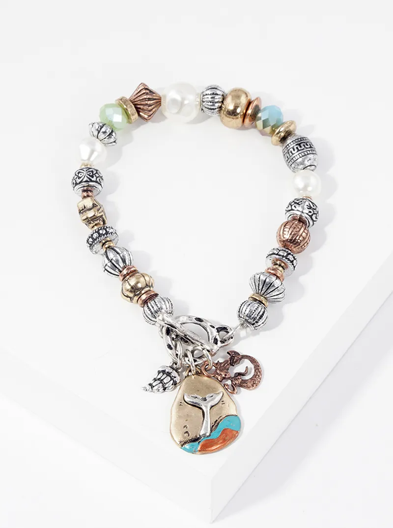Artisan sea life themed charms metal toggle closure stretch bracelet