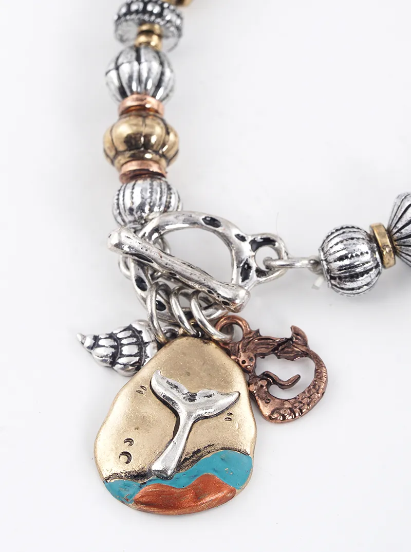 Artisan sea life themed charms metal toggle closure stretch bracelet