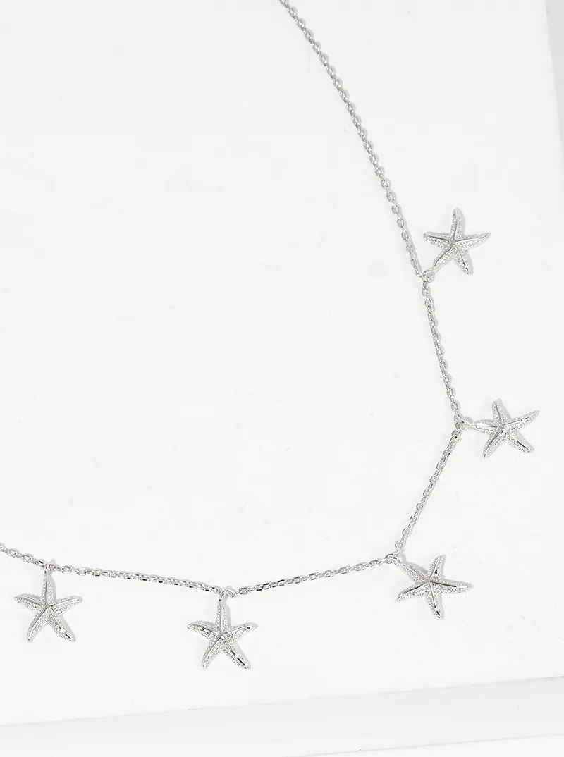 White gold dipped five starfish pendant necklace