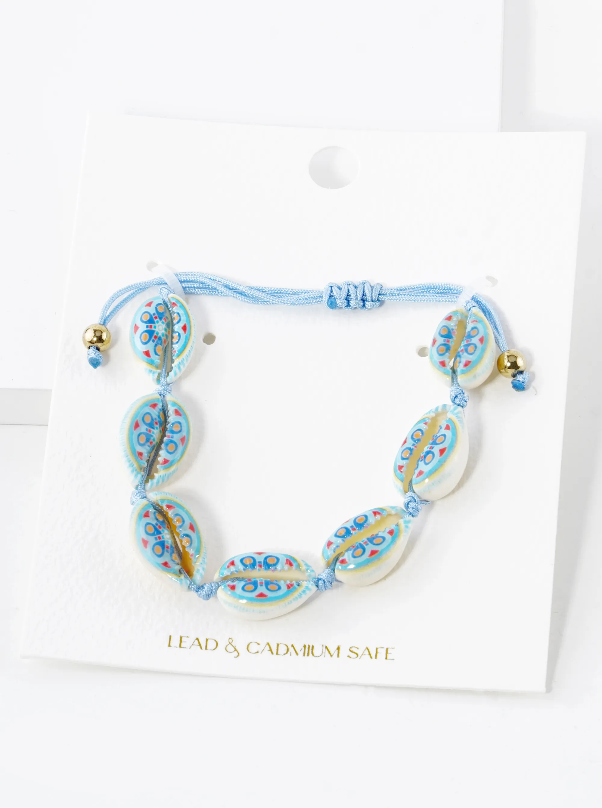 Multi Patterned Cowrie Shell Pull-Tie Bracelet