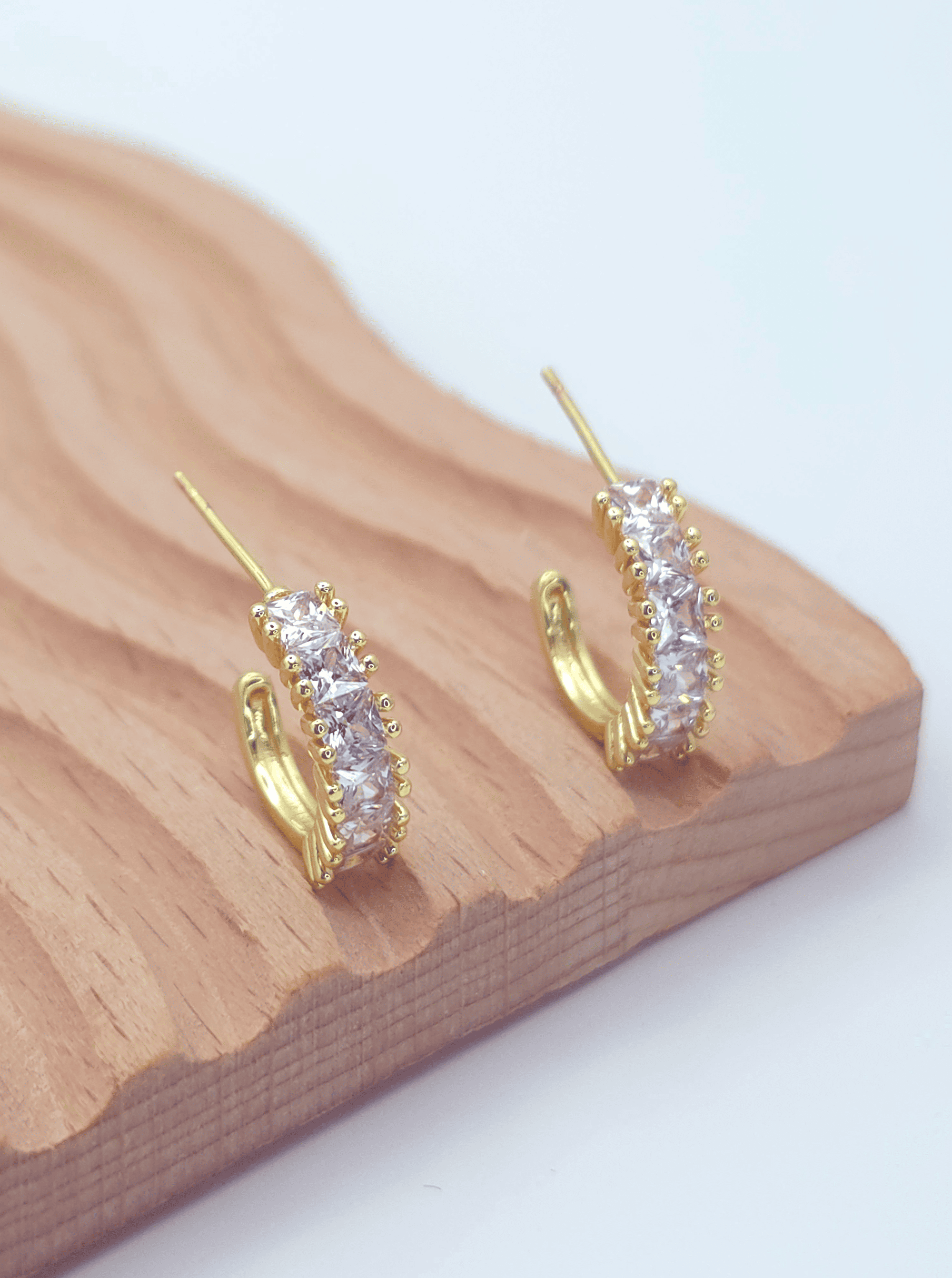 Faceted Crescent Huggie Earrings